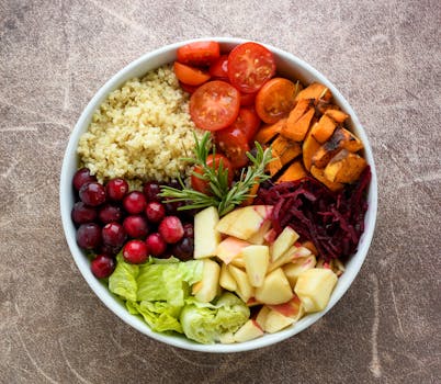 bowl of colorful quinoa salad with beans and veggies