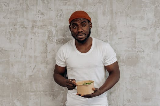 happy person enjoying a plant-based meal