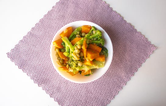 colorful buddha bowl with various vegetables