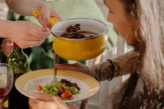 members of a plant-based community cooking together