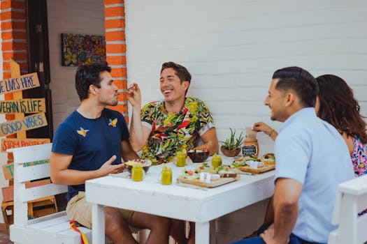 group of friends enjoying a plant-based meal